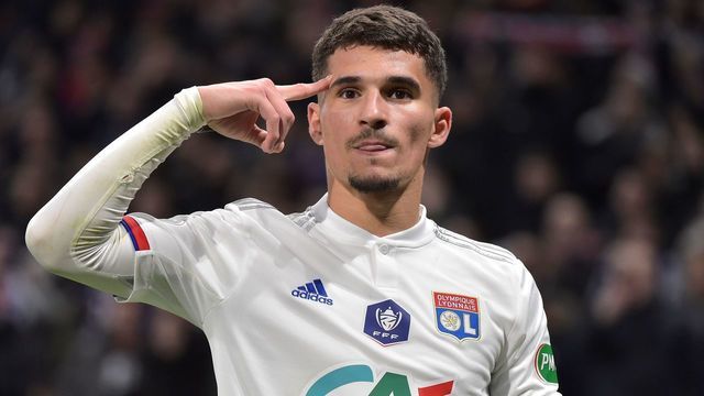 Lyon's French midfielder Houssem Aouar celebrates after scoring the opener during the French Cup quarter-final football match between Olympique Lyonnais and Olympique de Marseille at the Groupama stadium in Decines-Charpieu near Lyon, central eastern France on February 12, 2020.