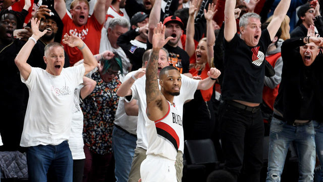 PORTLAND, OREGON - APRIL 23: Damian Lillard #0 of the Portland Trail Blazers waves goodbye to the Oklahoma City Thunder after hitting a last second 37 foot game winner to end Game Five of the Western Conference quarterfinals during the 2019 NBA Playoffs at Moda Center on April 23, 2019 in Portland, Oregon. The Blazers won 118-115.