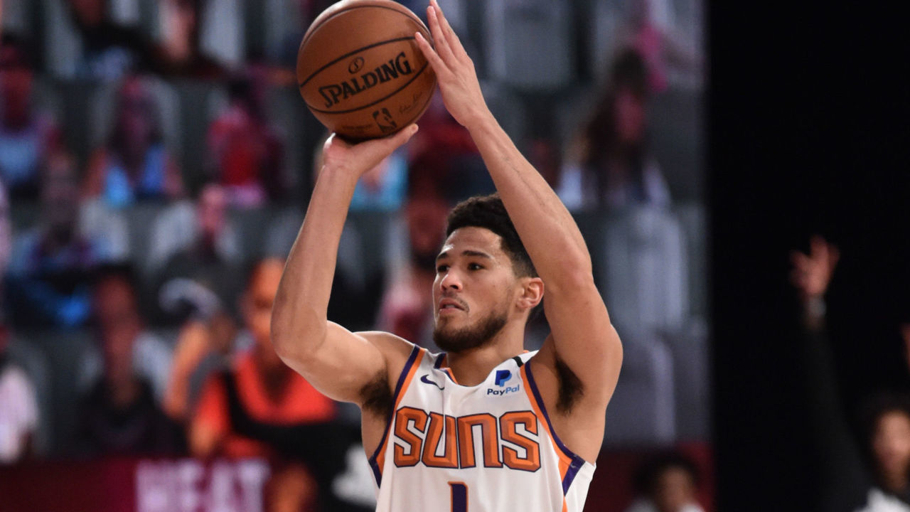 Orlando, FL - AUGUST 8: Devin Booker #1 of the Phoenix Suns shoots the ball against the Miami Heat on August 8, 2020 at Visa Athletic Center at ESPN Wide World of Sports in Orlando, Florida. NOTE TO USER: User expressly acknowledges and agrees that, by downloading and/or using this Photograph, user is consenting to the terms and conditions of the Getty Images License Agreement. Mandatory Copyright Notice: Copyright 2020 NBAE