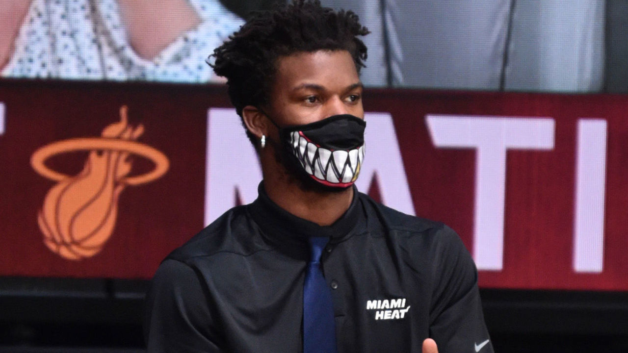 Orlando, FL - AUGUST 8: Jimmy Butler #22 of the Miami Heat looks on during the game against the Phoenix Suns on August 8, 2020 at Visa Athletic Center at ESPN Wide World of Sports in Orlando, Florida. NOTE TO USER: User expressly acknowledges and agrees that, by downloading and/or using this Photograph, user is consenting to the terms and conditions of the Getty Images License Agreement. Mandatory Copyright Notice: Copyright 2020 NBAE