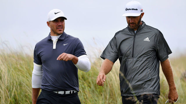 PORTRUSH, NORTHERN IRELAND - JULY 17: Brooks Koepka and Dustin Johnson of the United States look on during a practice round prior to the 148th Open Championship held on the Dunluce Links at Royal Portrush Golf Club on July 17, 2019 in Portrush, United Kingdom.