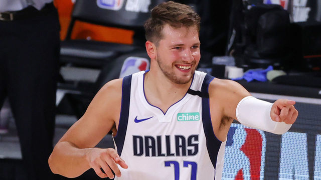 LAKE BUENA VISTA, FLORIDA - AUGUST 08: Luka Doncic #77 of the Dallas Mavericks celebrates a three point basket during the fourth quarter against the Milwaukee Bucks at The Arena at ESPN Wide World Of Sports Complex on August 08, 2020 in Lake Buena Vista, Florida.