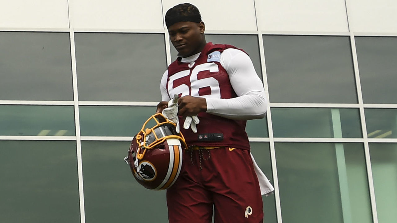 ASHBURN, VA - MAY 20: From left, Washington Redskins linebacker Ryan Kerrigan, linebacker Reuben Foster, and wide receiver Trey Quinn head to the field for the start of the Washington Redskins OTAs on Monday, May 20, 2019.