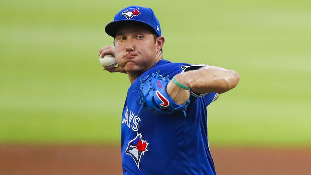 ATLANTA, GA - AUGUST 06: Nate Pearson #24 of the Toronto Blue Jays pitches in the first inning against the Atlanta Braves at Truist Park on August 6, 2020 in Atlanta, Georgia.