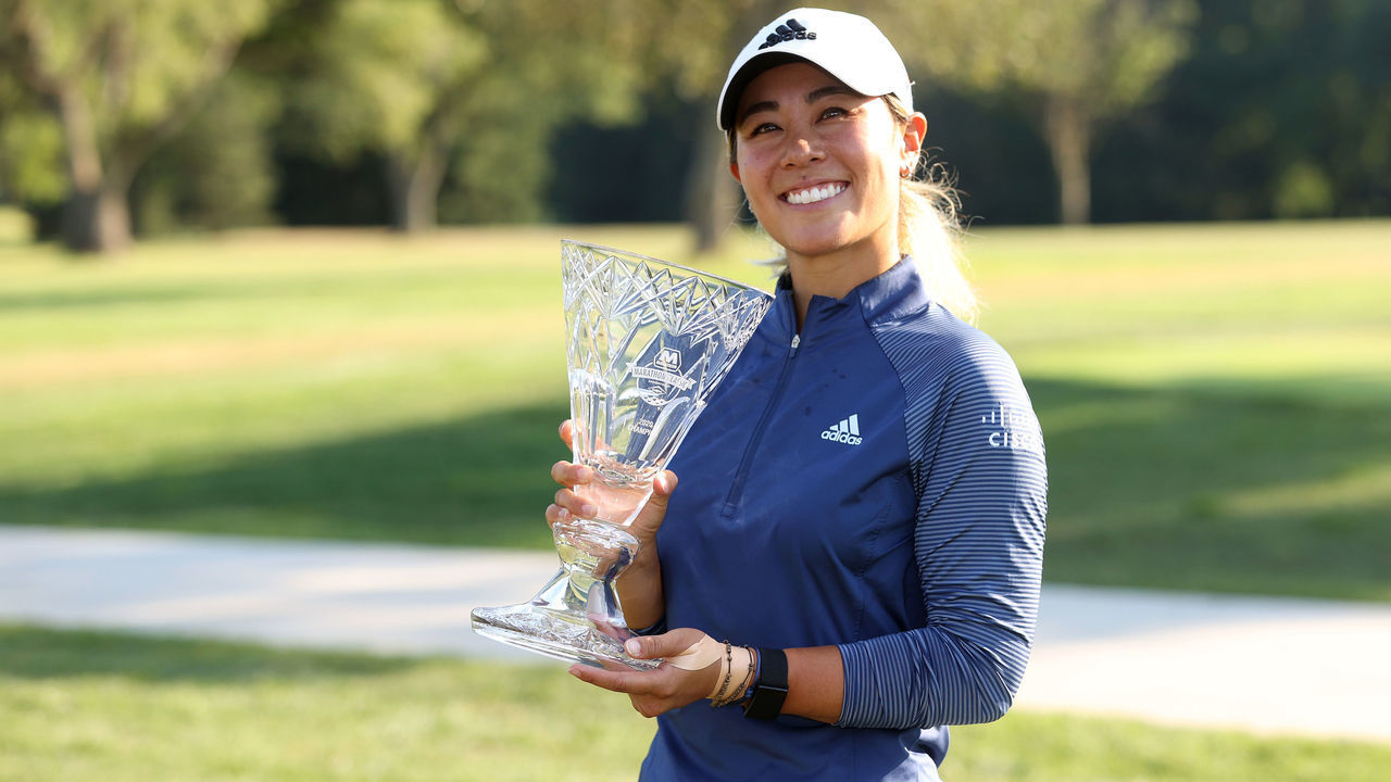 SYLVANIA, OHIO - AUGUST 09: Danielle Kang celebrates with the trophy after winning the Marathon LPGA Classic during the final round at Highland Meadows Golf Club on August 09, 2020 in Sylvania, Ohio.