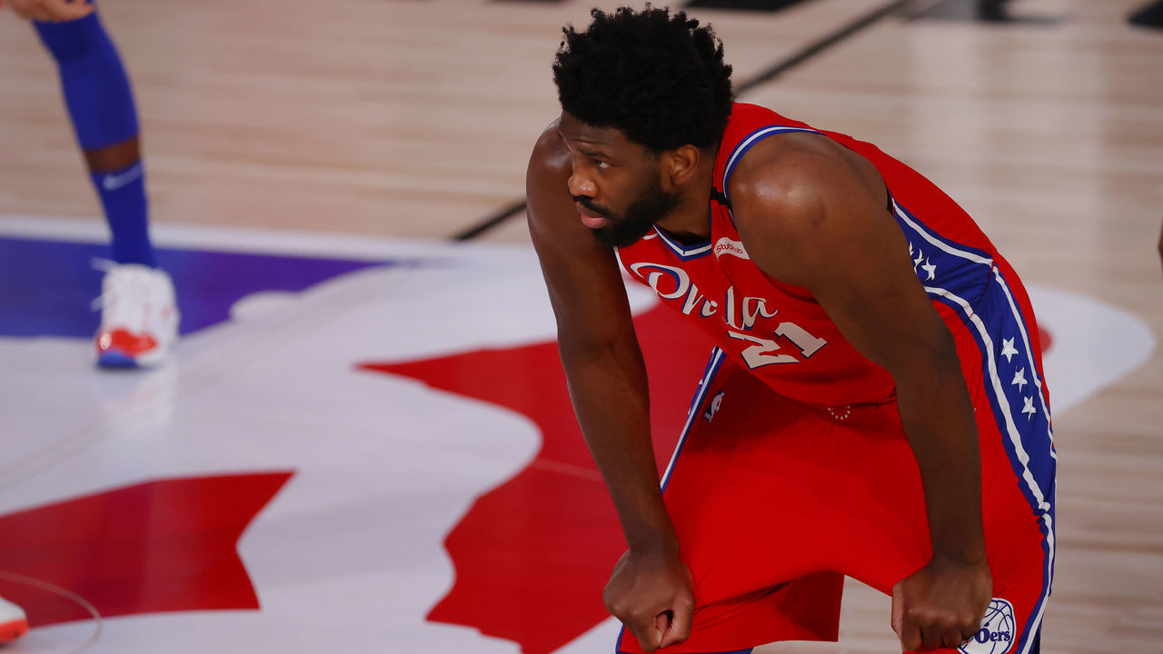 LAKE BUENA VISTA, FLORIDA - AUGUST 09: Joel Embiid #21 of the Philadelphia 76ers looks on against the Portland Trail Blazers at Visa Athletic Center at ESPN Wide World Of Sports Complex on August 09, 2020 in Lake Buena Vista, Florida.