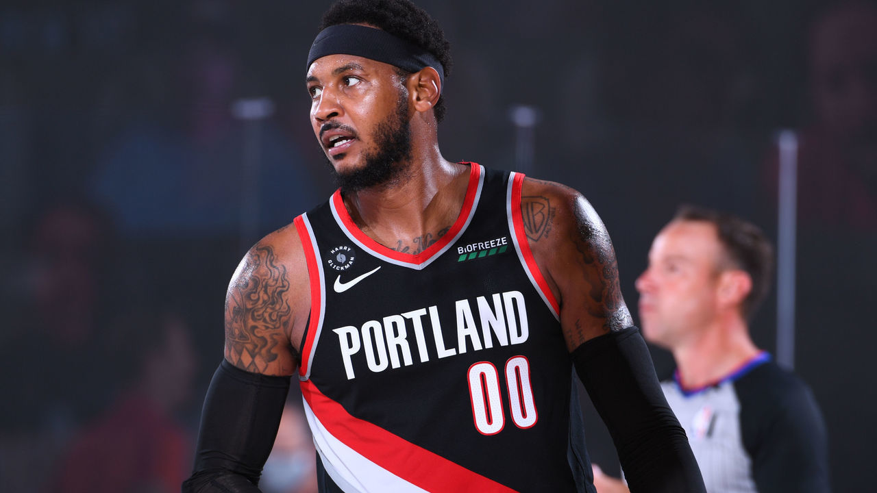 Orlando, FL - AUGUST 6: Carmelo Anthony #00 of the Portland Trail Blazers looks on during the game against the Denver Nuggets on August 6, 2020 at Visa Athletic Center at ESPN Wide World of Sports in Orlando, Florida. NOTE TO USER: User expressly acknowledges and agrees that, by downloading and/or using this Photograph, user is consenting to the terms and conditions of the Getty Images License Agreement. Mandatory Copyright Notice: Copyright 2020 NBAE