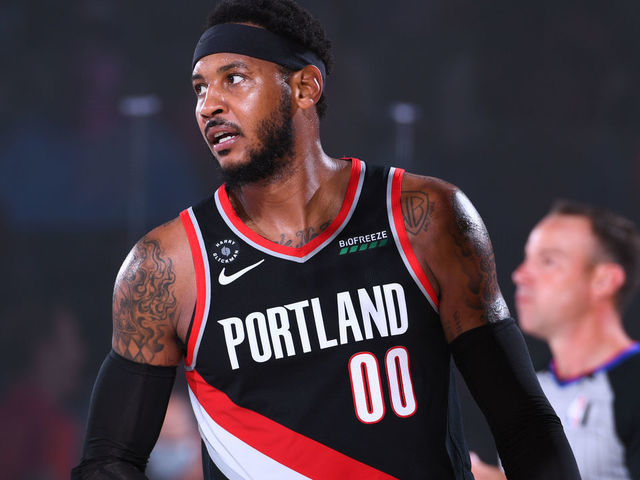 Orlando, FL - AUGUST 6: Carmelo Anthony #00 of the Portland Trail Blazers looks on during the game against the Denver Nuggets on August 6, 2020 at Visa Athletic Center at ESPN Wide World of Sports in Orlando, Florida. NOTE TO USER: User expressly acknowledges and agrees that, by downloading and/or using this Photograph, user is consenting to the terms and conditions of the Getty Images License Agreement. Mandatory Copyright Notice: Copyright 2020 NBAE
