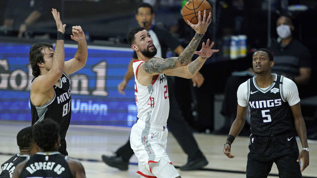 LAKE BUENA VISTA, FLORIDA - AUGUST 09: Austin Rivers #25 of the Houston Rockets puts up a shot against the Sacramento Kings in the first half at HP Field House at ESPN Wide World Of Sports Complex on August 9, 2020 in Lake Buena Vista, Florida.