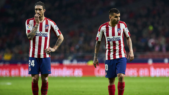 MADRID, SPAIN - FEBRUARY 08: Sime Vrsaljko (L) and Angel Martin Correa (R) of Atletico de Madrid during the Liga match between Club Atletico de Madrid and Granada CF at Wanda Metropolitano on February 8, 2020 in Madrid, Spain.