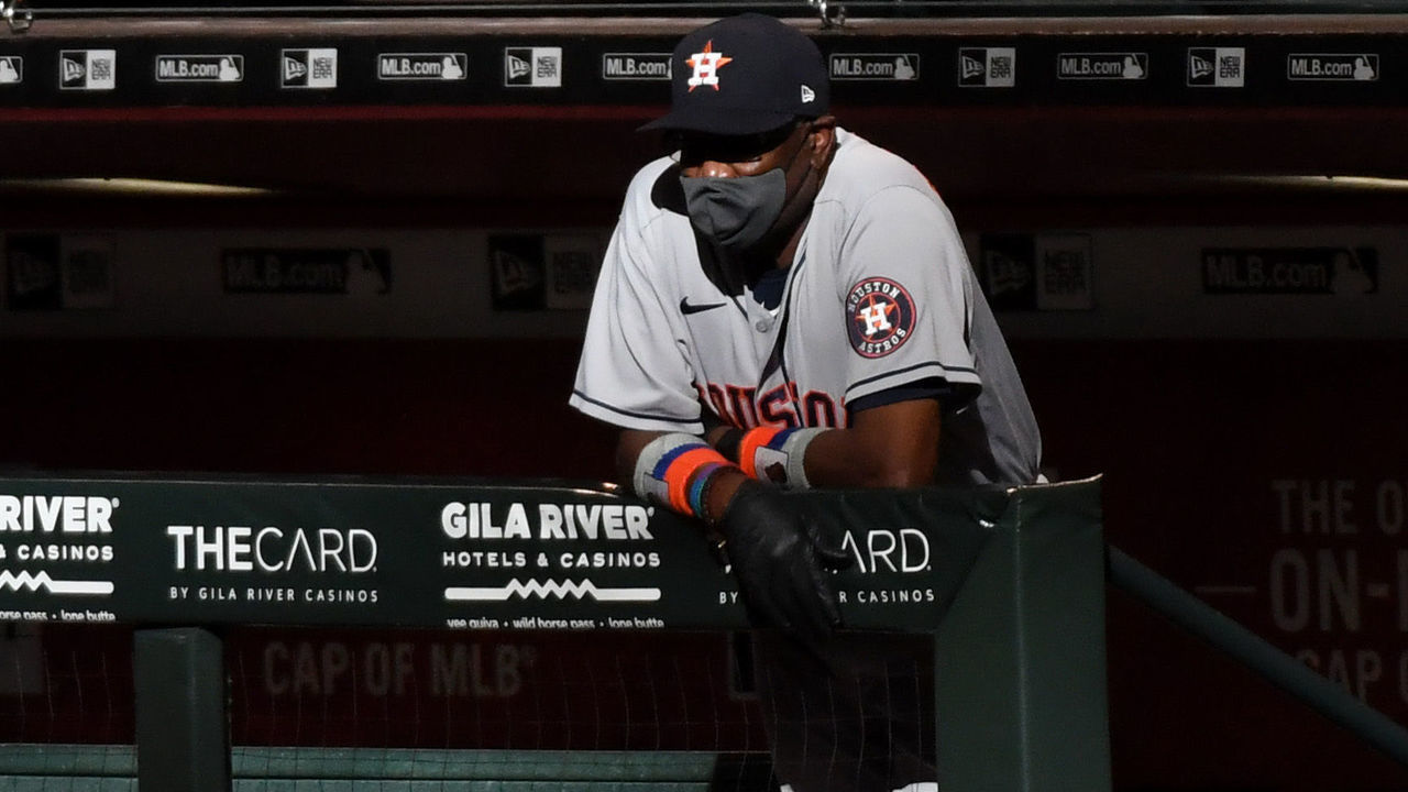 PHOENIX, ARIZONA - AUGUST 06: Manager Dusty Baker Jr #12 of the Houston Astros looks on from the top step of the dugout against the Arizona Diamondbacks during the fourth inning at Chase Field on August 06, 2020 in Phoenix, Arizona.