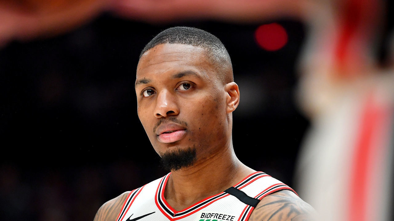 PORTLAND, OREGON - MARCH 04: Damian Lillard #0 of the Portland Trail Blazers looks on during the second half of the game against the Washington Wizards at the Moda Center on March 04, 2020 in Portland, Oregon. The Portland Trail Blazers topped the Washington Wizards, 125-105.