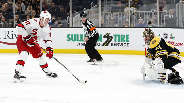 BOSTON, MA - DECEMBER 03: Carolina Hurricanes left wing Andrei Svechnikov (37) shoots on Boston Bruins goalie Jaroslav Halak (41) during a game between the Boston Bruins and the Carolina Hurricanes on December 3, 2019, at TD garden in Boston, Massachusetts.