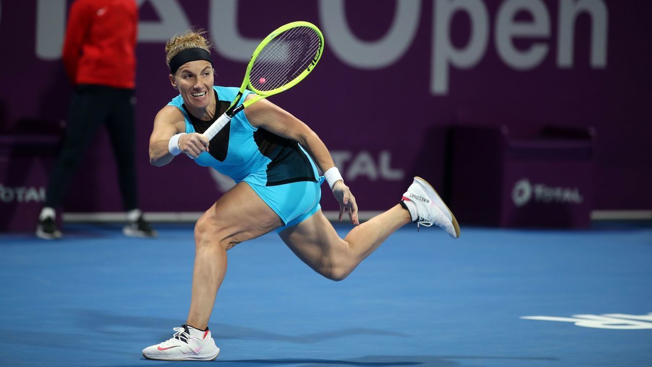 Svetlana Kuznetsova of Russia returns the ball to Belinda Bencic of Switzerland during the Qatar Total Open tournament in Doha, on February 27, 2020.