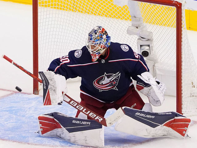 TORONTO, ONTARIO - AUGUST 07: Elvis Merzlikins #90 of the Columbus Blue Jackets makes a save against the Toronto Maple Leafs in Game Four of the Eastern Conference Qualification Round prior to the 2020 NHL Stanley Cup Playoffs at Scotiabank Arena on August 07, 2020 in Toronto, Ontario.