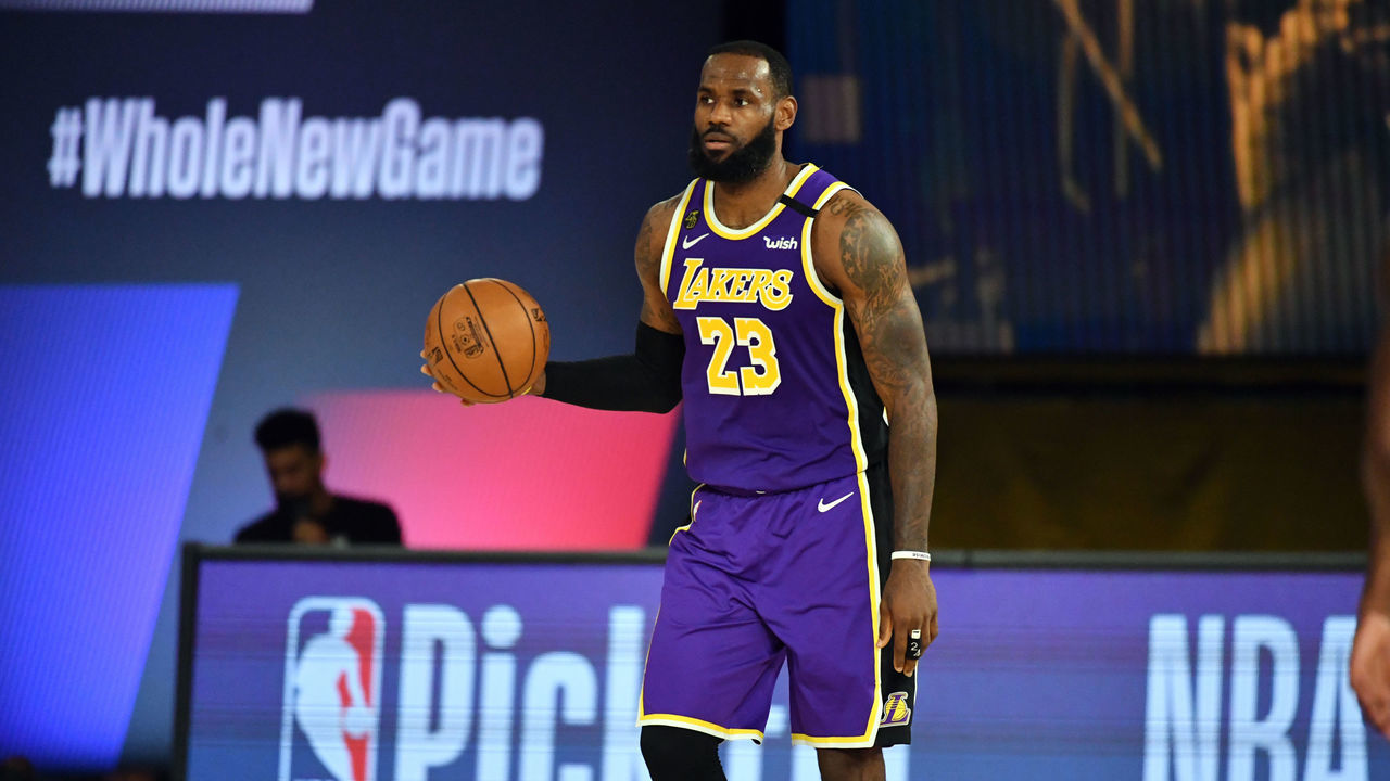 Orlando, FL - AUGUST 8: LeBron James #23 of the Los Angeles Lakers handles the ball during the game against the Indiana Pacers on August 8, 2020 at The Field House at ESPN Wide World Of Sports Complex in Orlando, Florida. NOTE TO USER: User expressly acknowledges and agrees that, by downloading and/or using this Photograph, user is consenting to the terms and conditions of the Getty Images License Agreement. Mandatory Copyright Notice: Copyright 2020 NBAE