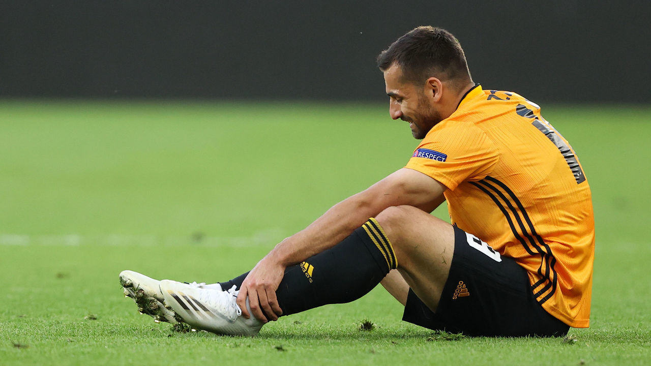 WOLVERHAMPTON, ENGLAND - AUGUST 06: Jonny Otto of Wolverhampton Wanderers goes down injured during the UEFA Europa League round of 16 second leg match between Wolverhampton Wanderers and Olympiacos FC at Molineux on August 06, 2020 in Wolverhampton, United Kingdom.