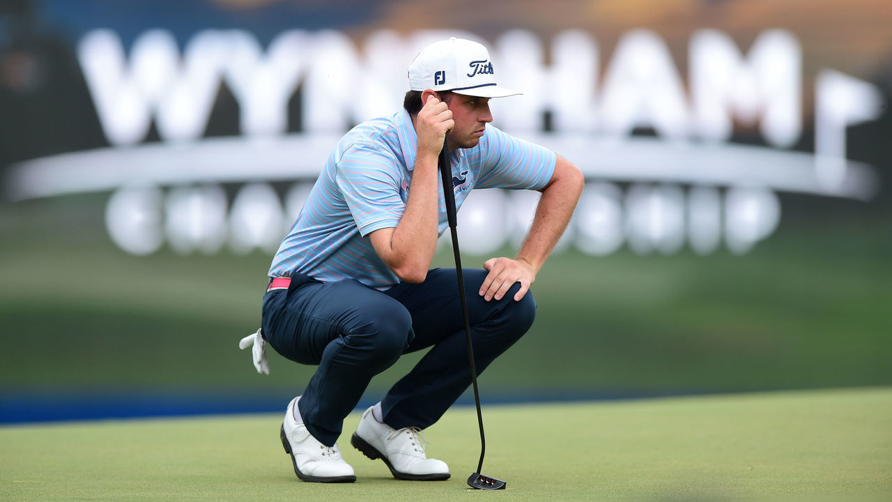 GREENSBORO, NORTH CAROLINA - AUGUST 04: J.T. Poston lines up a putt on the 18th green during the final round of the Wyndham Championship at Sedgefield Country Club on August 04, 2019 in Greensboro, North Carolina.