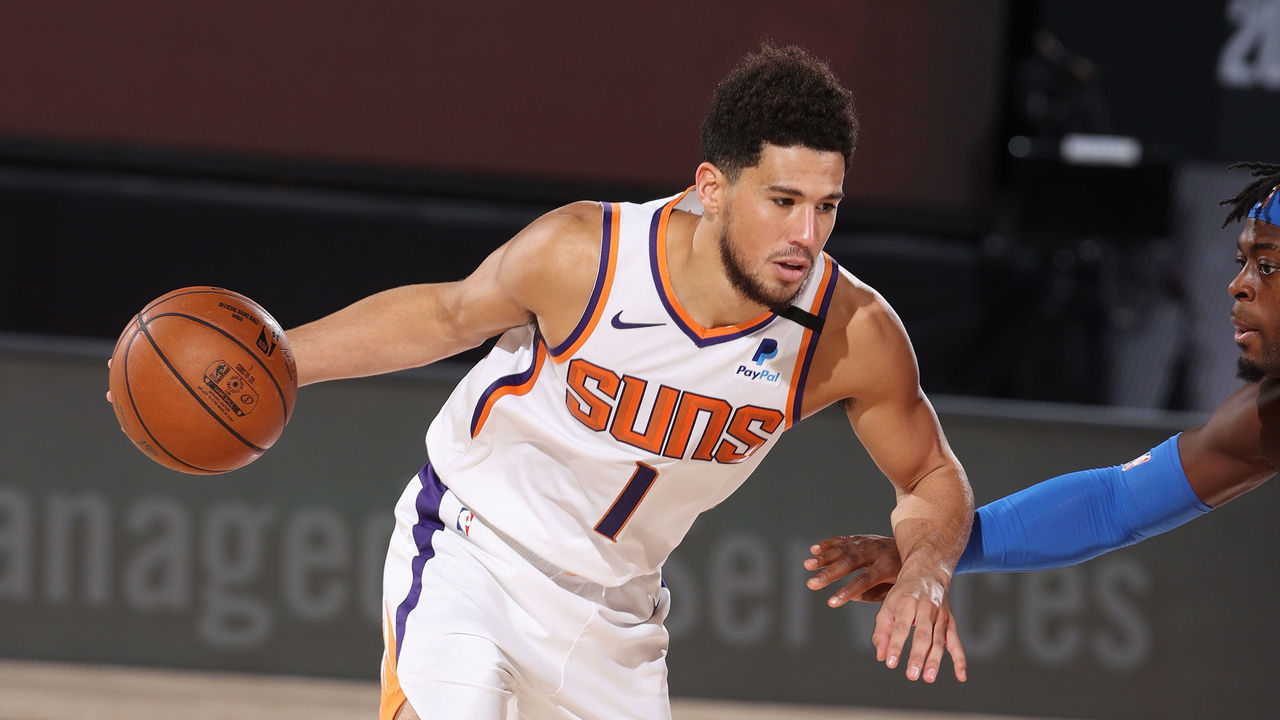 Orlando, FL - AUGUST 10: Devin Booker #1 of the Phoenix Suns handles the ball during the game against the Oklahoma City Thunder on August 10, 2020 at The Field House at ESPN Wide World Of Sports Complex in Orlando, Florida. NOTE TO USER: User expressly acknowledges and agrees that, by downloading and/or using this Photograph, user is consenting to the terms and conditions of the Getty Images License Agreement. Mandatory Copyright Notice: Copyright 2020 NBAE