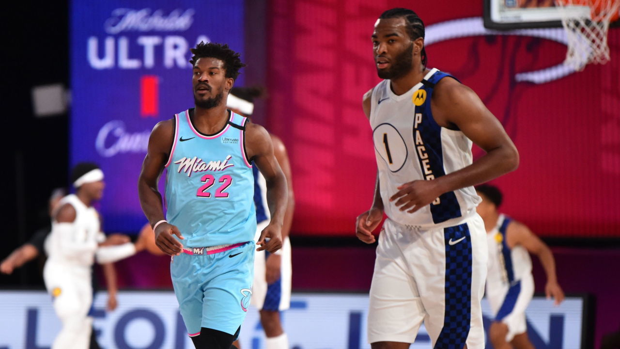Orlando, FL - AUGUST 10: Jimmy Butler #25 of the Miami Heat during a game against TJ Warren #1 of the Indiana Pacers on August 10, 2020 at the Visa Athletic Center at ESPN Wide World Of Sports Complex in Orlando, Florida. NOTE TO USER: User expressly acknowledges and agrees that, by downloading and/or using this Photograph, user is consenting to the terms and conditions of the Getty Images License Agreement. Mandatory Copyright Notice: Copyright 2020 NBAE