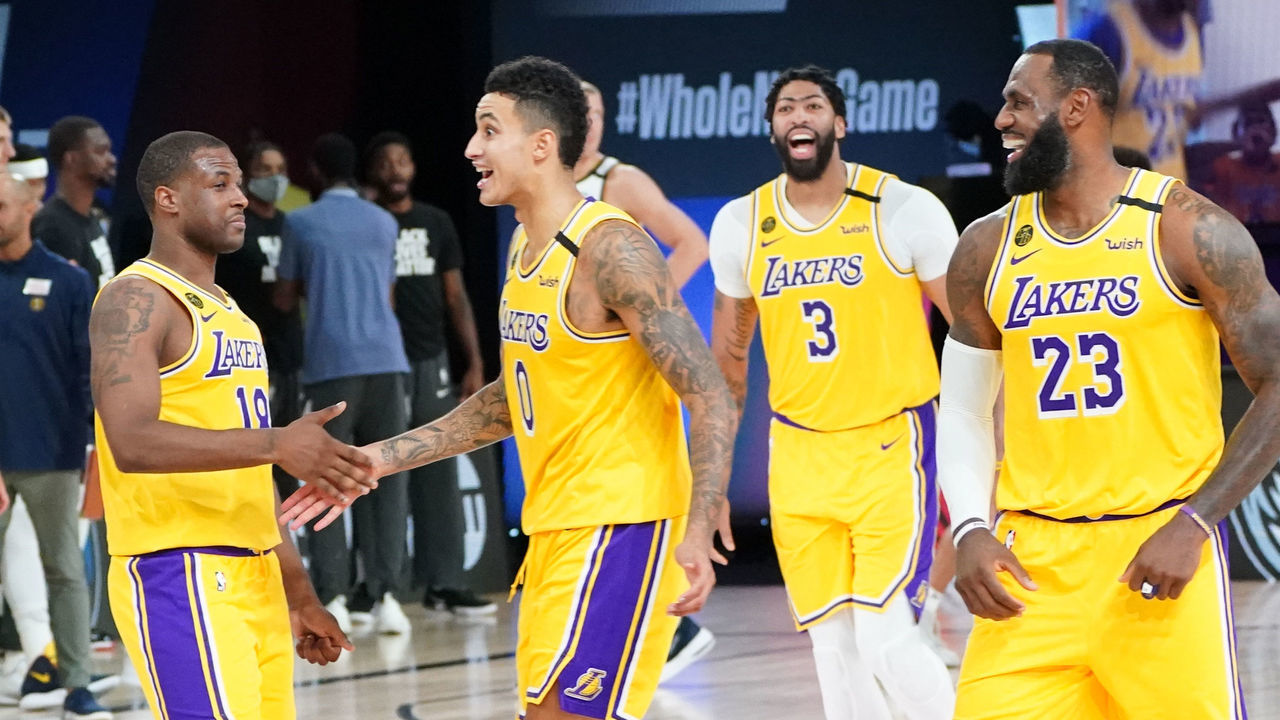 Orlando, FL - AUGUST 10: Dion Waiters #18 of the Los Angeles Lakers, Anthony Davis #3 of the Los Angeles Lakers, LeBron James #23 of the Los Angeles Lakers, and Kyle Kuzma #0 of the Los Angeles Lakers react after a game winning shot against the Denver Nuggets on August 10, 2020 at the AdventHealth Arena at in Orlando, Florida. NOTE TO USER: User expressly acknowledges and agrees that, by downloading and/or using this Photograph, user is consenting to the terms and conditions of the Getty Images License Agreement. Mandatory Copyright Notice: Copyright 2020 NBAE