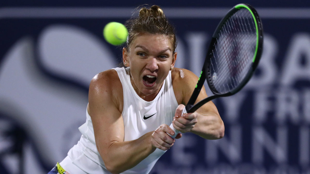 DUBAI, UNITED ARAB EMIRATES - FEBRUARY 22: Simona Halep of Romania plays a backhand against Elena Rybakina of Kazakhstan during their Women's Singles Final match of the WTA Dubai Duty Free Tennis Championship on Day Six of the Dubai Duty Free Tennis at Dubai Duty Free Tennis Stadium on February 22, 2020 in Dubai, United Arab Emirates.