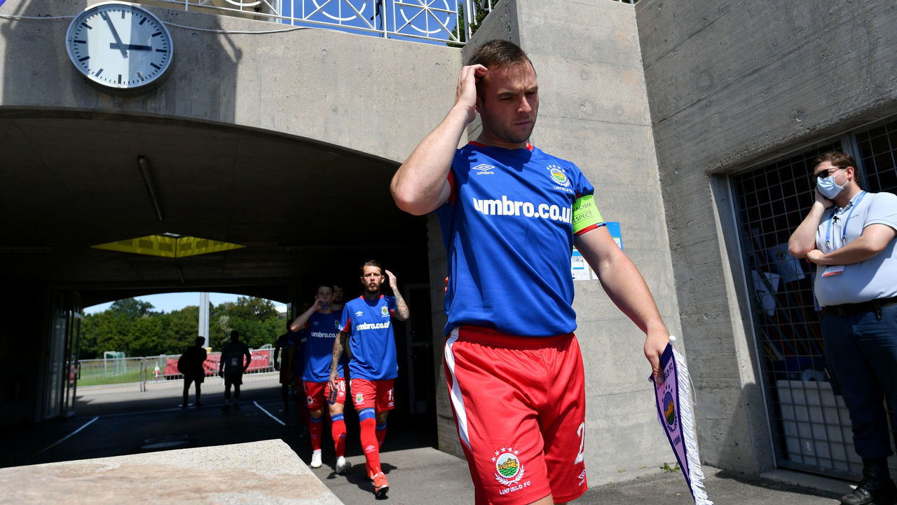 NYON, SWITZERLAND - AUGUST 08: Jamie Mulgrew of Linfield FC enters the pitch during the UEFA Champions League 2020/21 Preliminary Round Semi-final match between S.S. Tre Fiori F.C. and Linfield FC at Colovray Sports Center on August 8, 2020, in Nyon, Switzerland