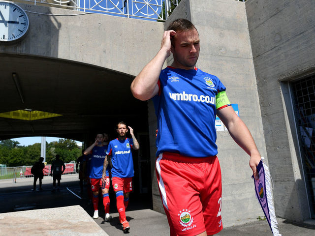 NYON, SWITZERLAND - AUGUST 08: Jamie Mulgrew of Linfield FC enters the pitch during the UEFA Champions League 2020/21 Preliminary Round Semi-final match between S.S. Tre Fiori F.C. and Linfield FC at Colovray Sports Center on August 8, 2020, in Nyon, Switzerland