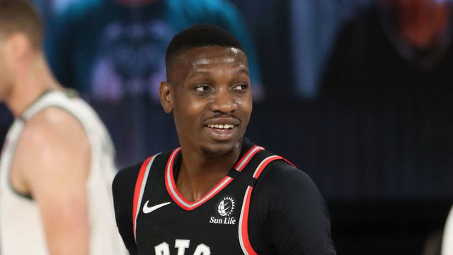 Orlando, FL - AUGUST 10: Chris Boucher #25 of the Toronto Raptors smiles during the game on August 10, 2020 at The Field House at ESPN Wide World Of Sports Complex in Orlando, Florida. NOTE TO USER: User expressly acknowledges and agrees that, by downloading and/or using this Photograph, user is consenting to the terms and conditions of the Getty Images License Agreement. Mandatory Copyright Notice: Copyright 2020 NBAE