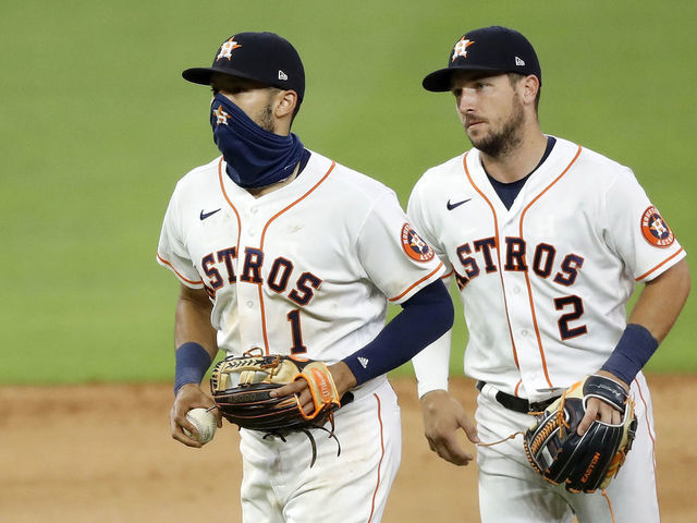 HOUSTON, TEXAS - AUGUST 10: The Houston Astros head off the field after defeating the San Francisco Giants 6-4 at Minute Maid Park on August 10, 2020 in Houston, Texas.