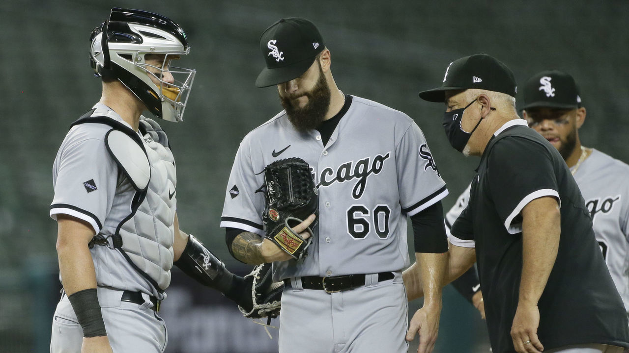DETROIT, MI - AUGUST 10: Dallas Keuchel #60 of the Chicago White Sox is taken out of the game by manager Rick Renteria #17 as catcher James McCann #33 looks on during the seventh inning against the Detroit Tigers at Comerica Park on August 10, 2020, in Detroit, Michigan. The Tigers defeated the White Sox 5-1.