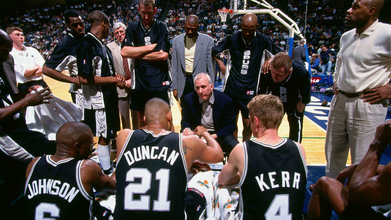 SAN ANTONIO - 1999: Steve Kerr #4 and Head Coach Gregg Popovich of the San Antonio Spurs talk during a game circa 1999 at the SBC Center in San Antonio, Texas. Mandatory Copyright Notice: Copyright 1999 NBAE