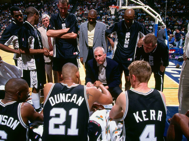 SAN ANTONIO - 1999: Steve Kerr #4 and Head Coach Gregg Popovich of the San Antonio Spurs talk during a game circa 1999 at the SBC Center in San Antonio, Texas. Mandatory Copyright Notice: Copyright 1999 NBAE