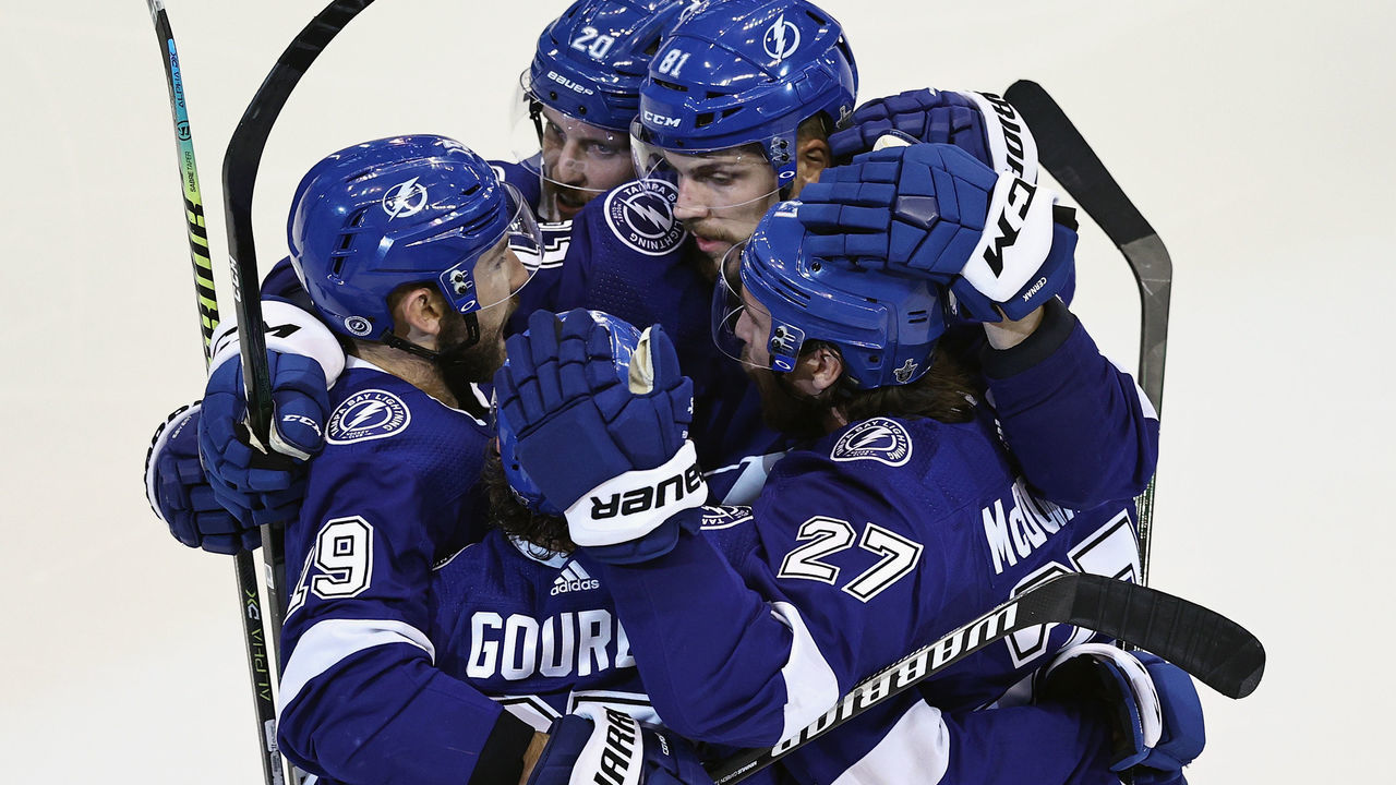 TORONTO, ONTARIO - AUGUST 11: Yanni Gourde #37 and the Tampa Bay Lightning celebrate his game tying goal at 23 seconds of the third period against the Columbus Blue Jackets in Game One of the Eastern Conference First Round during the 2020 NHL Stanley Cup Playoffs at Scotiabank Arena on August 11, 2020 in Toronto, Ontario, Canada.