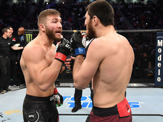 NORFOLK, VA - FEBRUARY 29: (L-R) Ion Cutelaba and Magomed Ankalaev exchange words after their light heavyweight bout during the UFC Fight Night event at Chartway Arena on February 29, 2020 in Norfolk, Virginia.