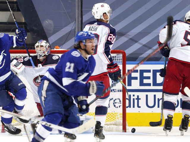 TORONTO, ONTARIO - AUGUST 11: Ondrej Palat #18 of the Tampa Bay Lightning celebrates after Brayden Point #21 scored the game winning goal at 10:27 in the fifth overtime to win Game One of the Eastern Conference First Round of the 2020 NHL Stanley Cup Playoff with a score of 3-2 over the Columbus Blue Jackets at Scotiabank Arena on August 11, 2020 in Toronto, Ontario.