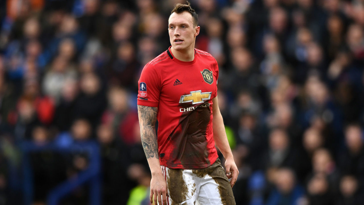 BIRKENHEAD, ENGLAND - JANUARY 26: Phil Jones of Manchester United covered in mud during the FA Cup Fourth Round match between Tranmere Rovers and Manchester United at Prenton Park on January 26, 2020 in Birkenhead, England.
