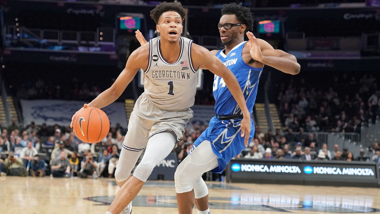 4WASHINGTON, DC - JANUARY 15: Jamorko Pickett #1 of the Georgetown Hoyas dribbles by Denzel Mahoney #34 of the Creighton Bluejays during a college basketball game at the Capital One Arena on January 15, 2020 in Washington, DC.