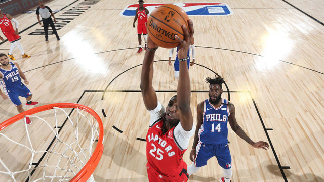 ORLANDO, FL - AUGUST 12: Chris Boucher #25 of the Toronto Raptors dunks the ball against the Philadelphia 76ers on August 12, 2020 at The Field House in Orlando, Florida. NOTE TO USER: User expressly acknowledges and agrees that, by downloading and/or using this Photograph, user is consenting to the terms and conditions of the Getty Images License Agreement. Mandatory Copyright Notice: Copyright 2020 NBAE