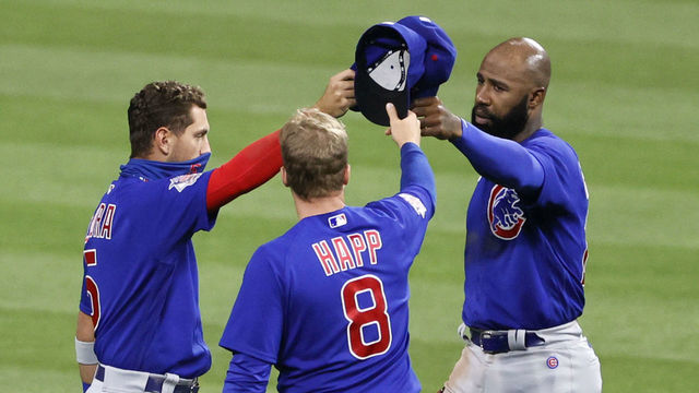 CLEVELAND, OH - AUGUST 12: Albert Almora #5, Ian Happ #8 and Jason Heyward #22 of the Chicago Cubs celebrate a 7-2 victory over the Cleveland Indians at Progressive Field on August 12, 2020 in Cleveland, Ohio.