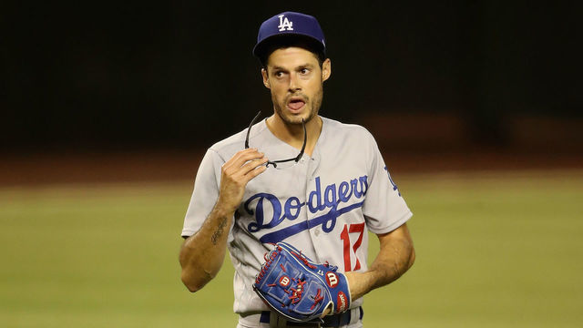 PHOENIX, ARIZONA - JULY 30: Relief pitcher Joe Kelly #17 of the Los Angeles Dodgers reacts as he pitches against the Arizona Diamondbacks during the seventh inning of the MLB game at Chase Field on July 30, 2020 in Phoenix, Arizona.