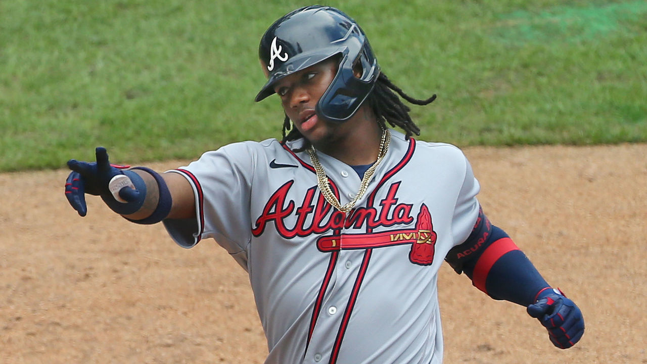 PHILADELPHIA, PA - AUGUST 09: Ronald Acuna Jr. #13 of the Atlanta Braves reacts after he hit a home run against the Philadelphia Phillies in game one of a double header at Citizens Bank Park on August 9, 2020 in Philadelphia, Pennsylvania.
