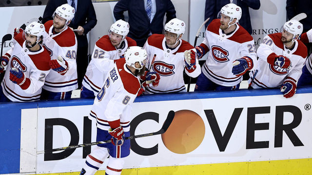 TORONTO, ONTARIO - AUGUST 12: Shea Weber #6 of the Montreal Canadiens is congratulated by teammates on the bench after he scored a power play goal in the second period against the Philadelphia Flyers in Game One of the Eastern Conference First Round during the 2020 NHL Stanley Cup Playoffs at Scotiabank Arena on August 12, 2020 in Toronto, Ontario.