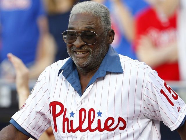 PHILADELPHIA, PA - AUGUST 09: Former Philadelphia Phillies great Dick Allen is introduced during a ceremony to honor former manager Charlie Manuel who was inducted to the Phillies Wall of Fame before the start of a game against the New York Mets at Citizens Bank Park on August 9, 2014 in Philadelphia, Pennsylvania.