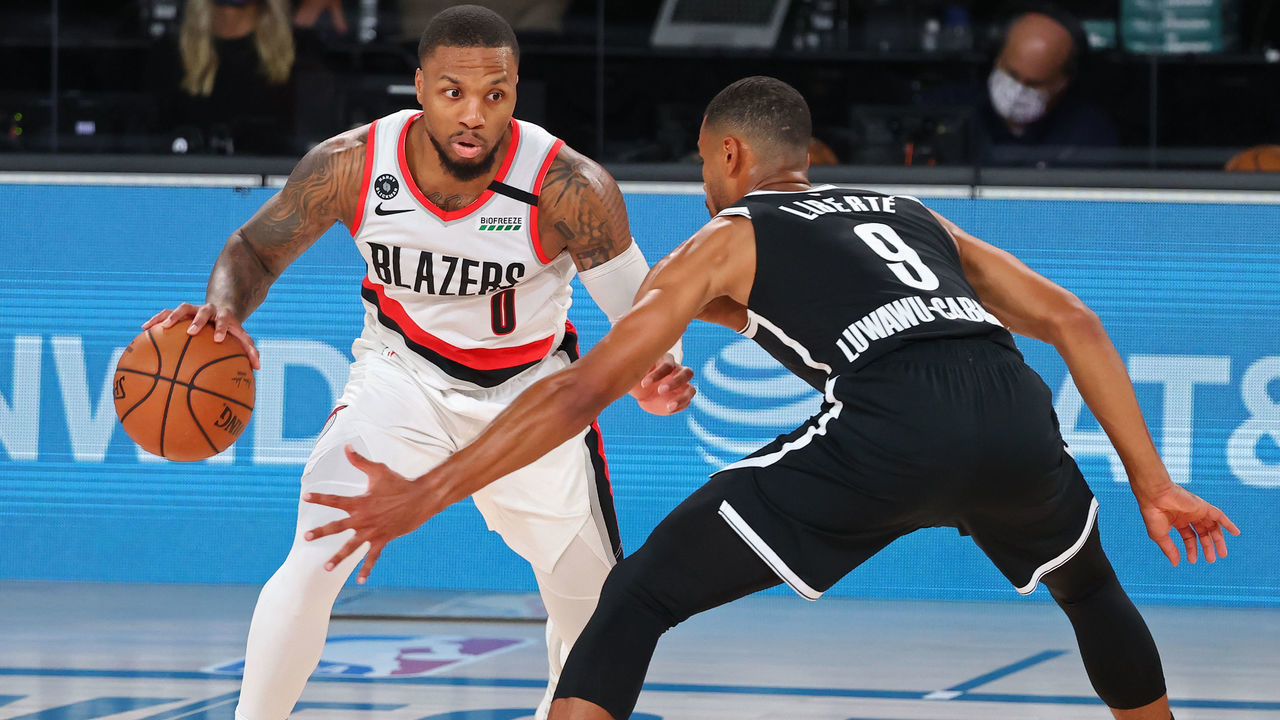ORLANDO, FL - AUGUST 13: Damian Lillard #0 of the Portland Trail Blazers drives to the basket against the Brooklyn Nets on August 13, 2020 in Orlando, Florida at AdventHealth Arena at ESPN Wide World of Sports. NOTE TO USER: User expressly acknowledges and agrees that, by downloading and/or using this photograph, user is consenting to the terms and conditions of the Getty Images License Agreement. Mandatory Copyright Notice: Copyright 2020 NBAE