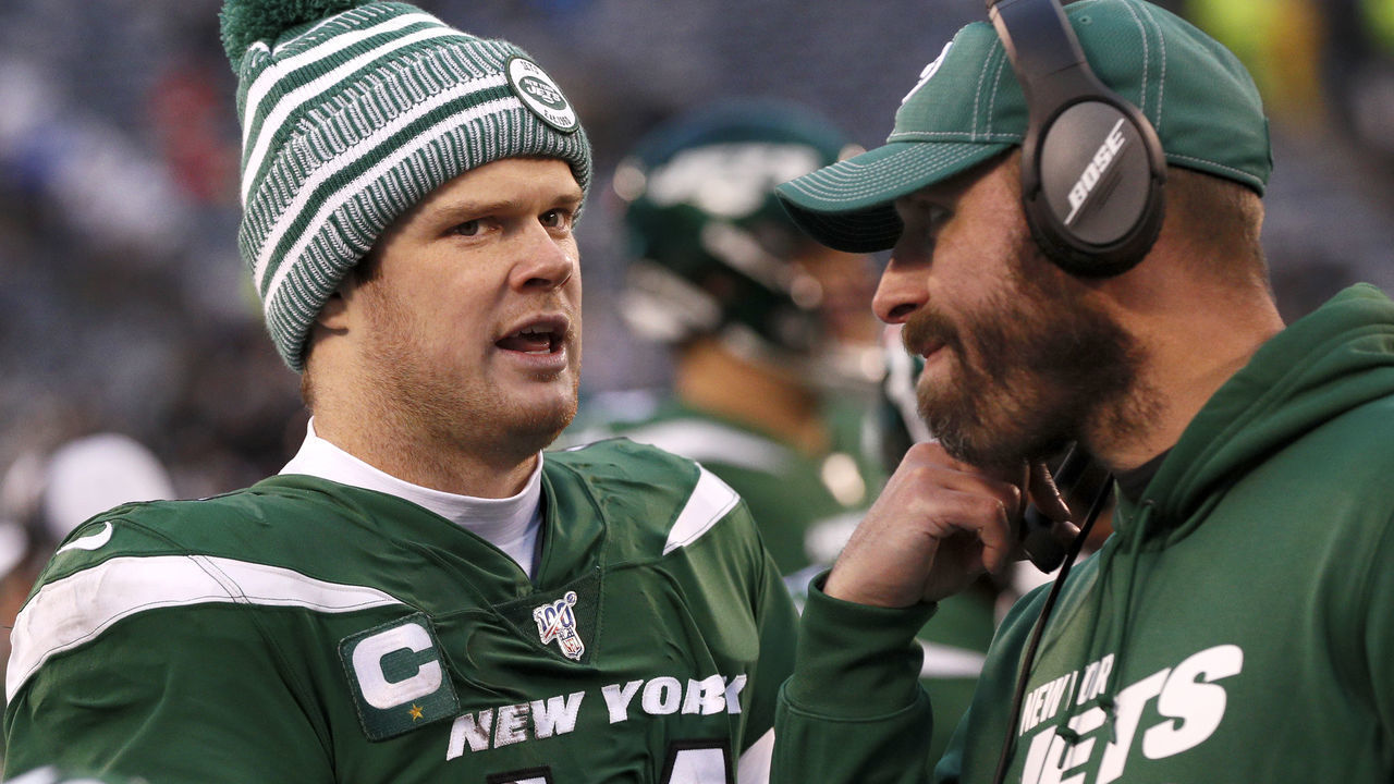 EAST RUTHERFORD, NJ - NOVEMBER 24: Quarterback Sam Darnold #14 of the New York Jets talks with head coach Adam Gase of the New York Jets on the sideline in an NFL football game against the Oakland Raiders on November 24, 2019 at MetLife Stadium in East Rutherford, New Jersey. Jets won 34-3.