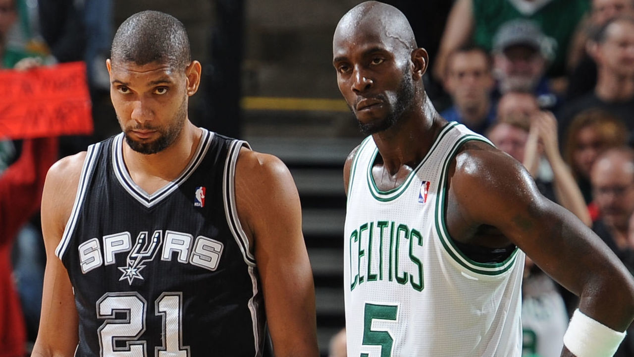 BOSTON - NOVEMBER 21: Tim Duncan #21 of the San Antonio Spurs and Kevin Garnett #5 of the Boston Celtics look on during the game on November 21, 2012 at the TD Garden in Boston, Massachusetts. Mandatory Copyright Notice: Copyright 2012 NBAE