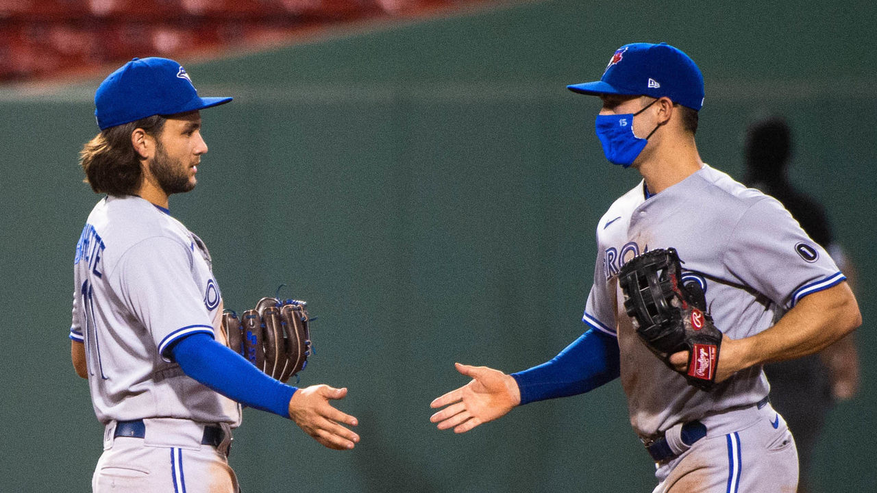 BOSTON, MA - AUGUST 8: Bo Bichette #11 celebrates with teammate Randal Grichuk #15 of the Toronto Blue Jays after beating the Boston Red Sox at Fenway Park on August 8, 2020 in Boston, Massachusetts.