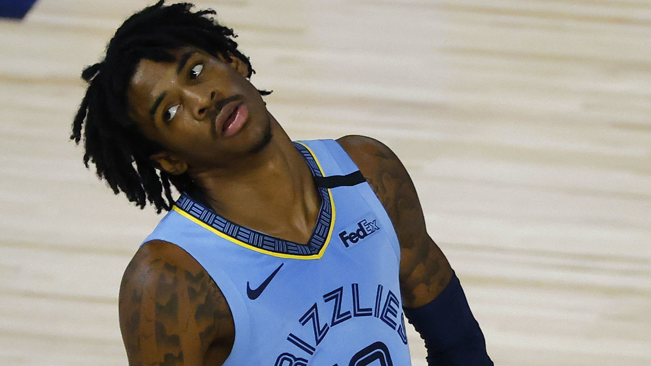 LAKE BUENA VISTA, FLORIDA - AUGUST 15: Ja Morant #12 of the Memphis Grizzlies reacts after a loss to the Portland Trail Blazers during the Western Conference play-in game one at The Field House at ESPN Wide World Of Sports Complex on August 15, 2020 in Lake Buena Vista, Florida.