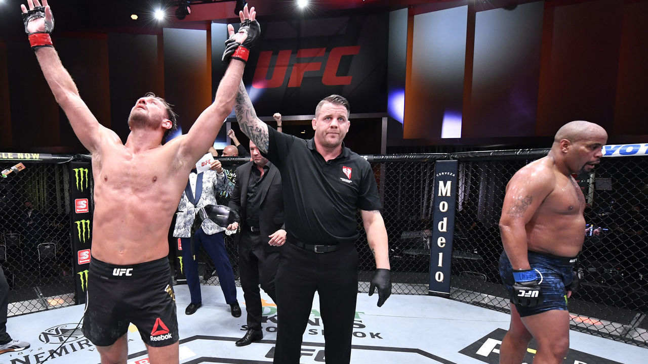 LAS VEGAS, NEVADA - AUGUST 15: In this handout image provided by UFC, Stipe Miocic celebrates after his victory over Daniel Cormier in their UFC heavyweight championship bout during the UFC 252 event at UFC APEX on August 15, 2020 in Las Vegas, Nevada.